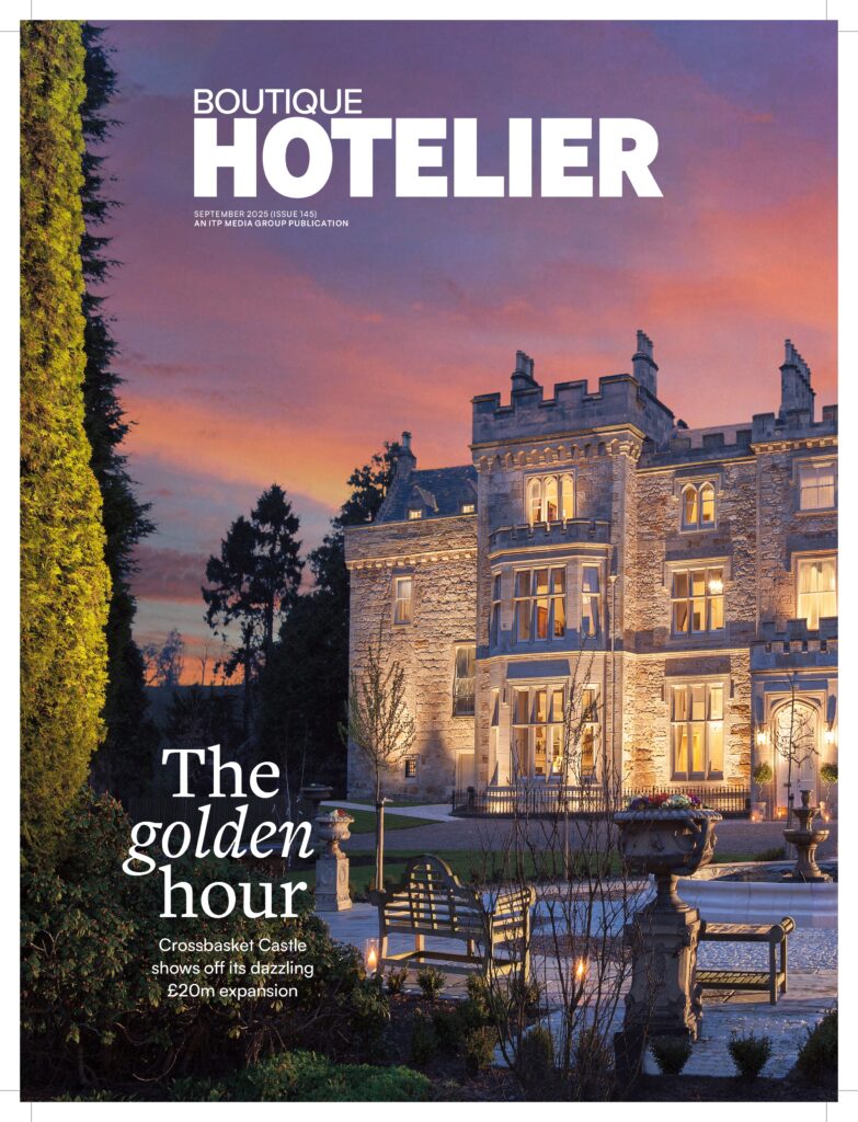 Boutique Hotelier cover featuring luxury heritage hotel exterior at sunset.