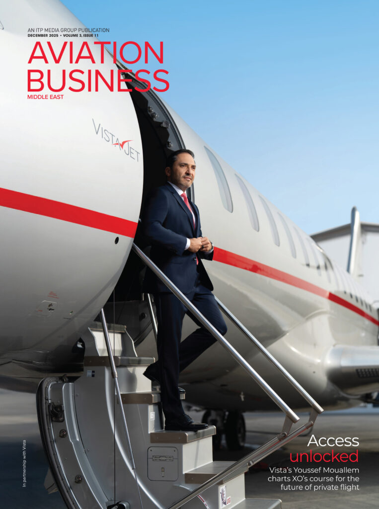 Aviation Business Middle East magazine cover featuring executive standing beside private jet aircraft.