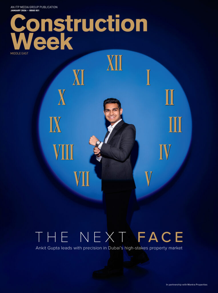 Construction Week magazine cover featuring an executive in a blue suit standing in front of a large clock backdrop titled “The Next Face.”