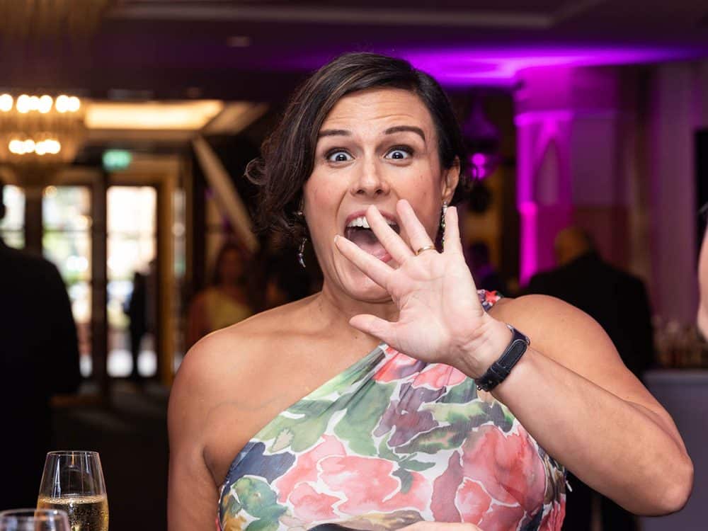 Professional attending an industry networking event representing Facilities Management Middle East social and community engagement.