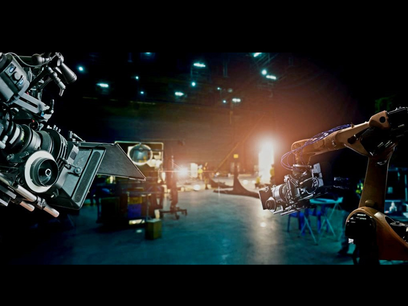 Professional broadcast cameras and robotic filming equipment inside a modern production studio representing Digital Studio India media and production technology.